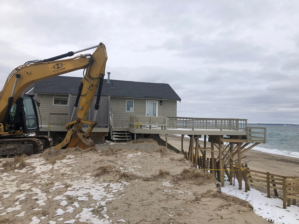 A home on Salt Marsh Road in Sandwich is damaged beyond repair after a February storm
